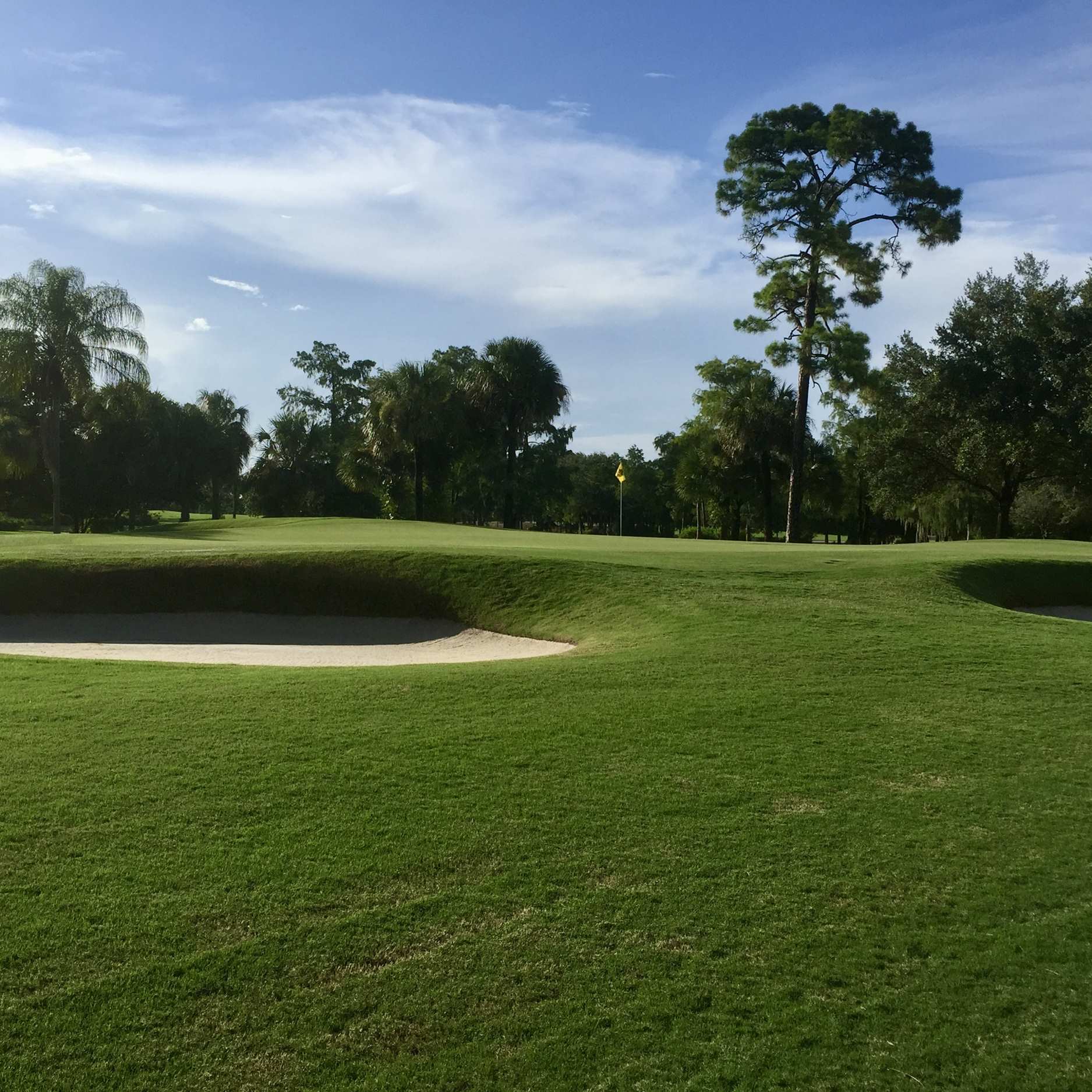 naples golf communities with more than one course