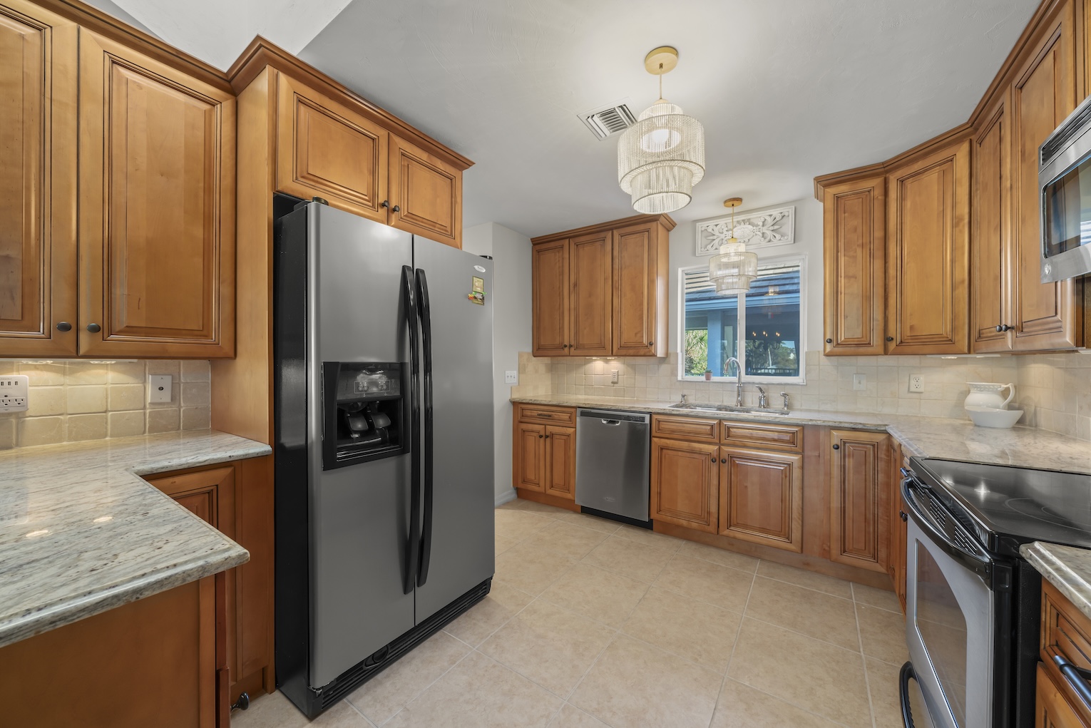 Eagle Creek Golf & Country Club condo for sale has granite counter tops in the kitchen