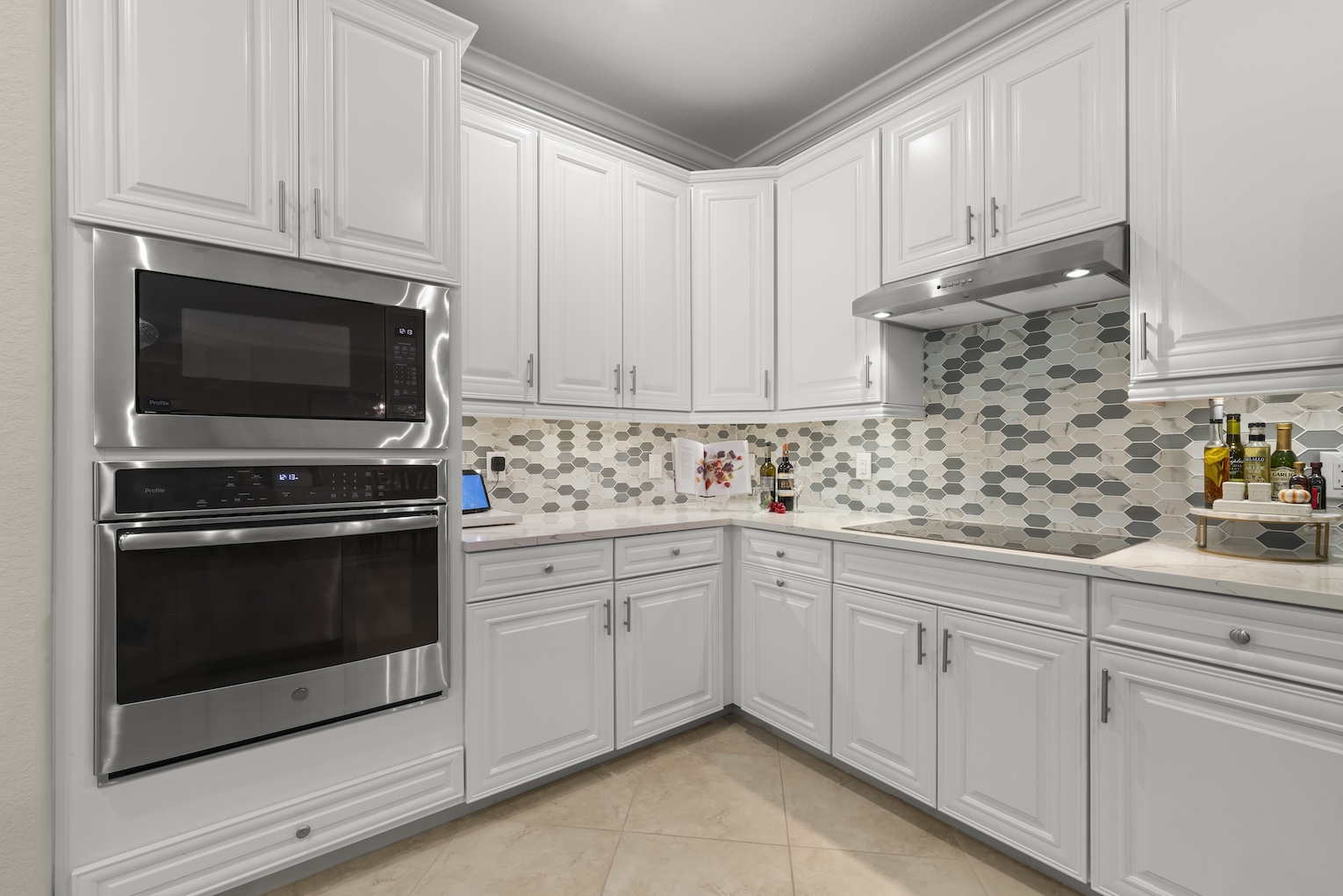 Renovated kitchen in TwinEagles home with immediate golf membership